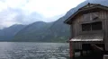 Boathouse closeup at Hallstatt lake with Dachstein mountain HD Footage
