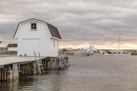 Boathouse on Dock at Sunset Stock Photos