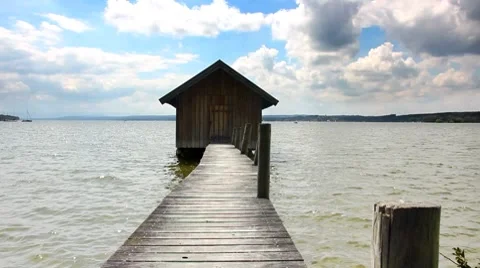 Boathouse with footbridge Stock Footage 8679353