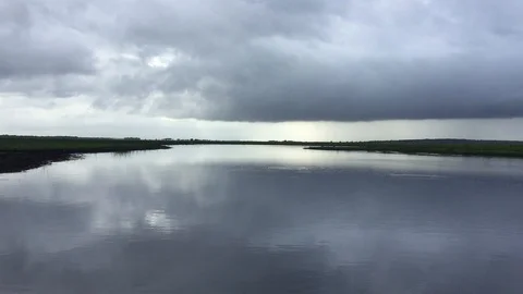 Boating across Smooth Water Stock Footage 91259097
