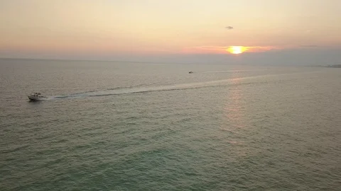 Boating Aerial at Sunset Tracking Video stock 95564668