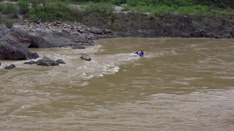 Boating Amidst the Himalayan Backdrop in Rishikesh Stock Footage 313564301