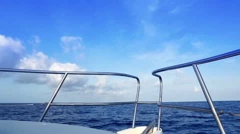 Boating in blue ocean sea view from boat bow deck Stock Footage