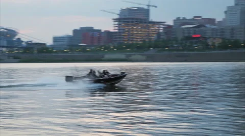 Boating Fast on Ohio River Dusk at Cincinnati Stock-Footage 56705106