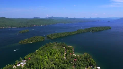 Boating Lake George Long Canoe Speaker Heck Island aerial drone Up State New Video stock 340964337