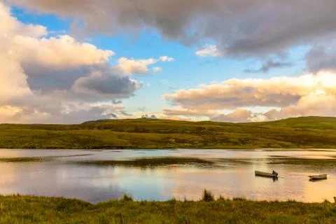 Boating on the lake in the sunlight Stock Photos
