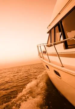 Boating at sunset Stock Photos