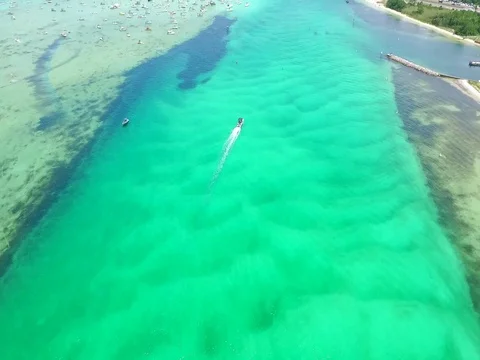 Boating through the Emerald waters to the Sandbar Video stock 77573483