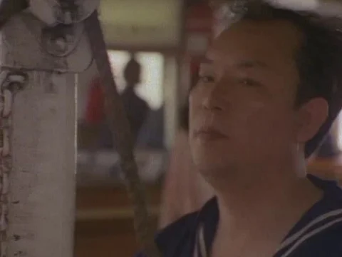 Boatman closing the gates of entry after embarking the passengers on his ferry Stock Footage 79877747