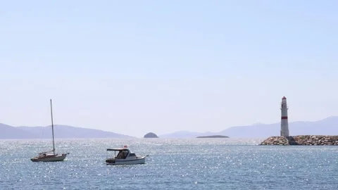 Boats and the Lighthouse Stock Footage 236663105