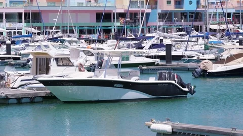 Boats and yachts moored in marina slow motion 4k Stock Footage