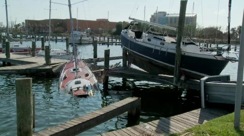 Boats are beached after Hurricane Ike rips through Galveston Texas. Stock Footage