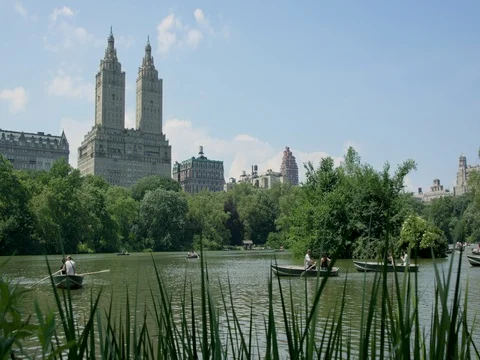 Boats in  Central Park with The Eldorado on a background Stock Footage 79849988