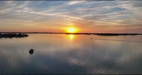 Boats crossing paths during the sunset Stock Footage 166593509