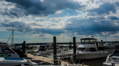Boats at the dock cloudy sky timelapse Stock Footage 34616540