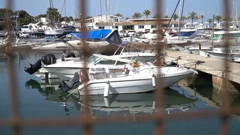 Boats by a dock Stock Footage 128349838