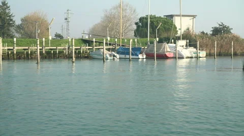 Boats docked along a river Stock Footage 60071832