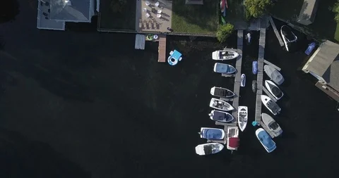 Boats Docked on a Lake Stock Footage 114711675