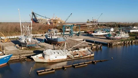 Boats in dry dock for repairs deep in the bayou Stock Footage 101402311