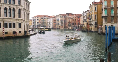Boats float on back canals in Venice Italy. Shot filmed in 4k 2160p Stock Footage 120415397