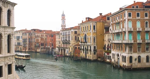Boats float on back canals in Venice Italy. Shot filmed in 4k 2160p Stock Footage 120415842