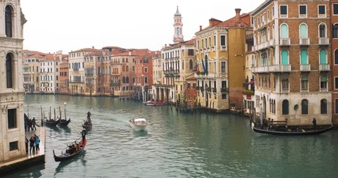 Boats float on back canals in Venice Italy. Shot filmed in 4k 2160p Stock Footage 120415888