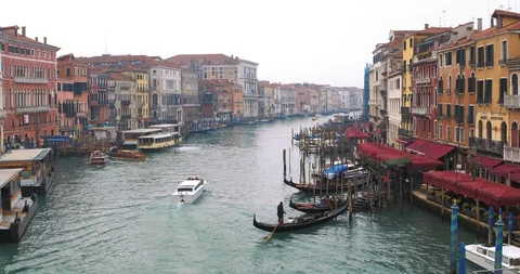 Boats float on back canals in Venice Italy. Shot filmed in 4k 2160p Stock Footage 120416586