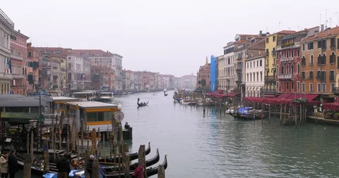 Boats float on back canals in Venice Italy. Shot filmed in 4k 2160p Stock Footage 120417121
