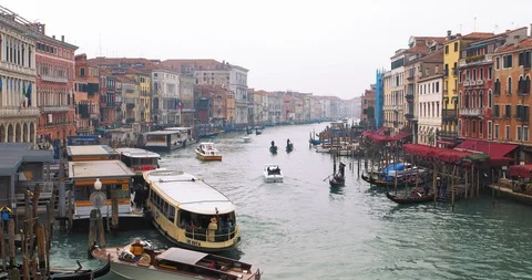 Boats float on back canals in Venice Italy. Shot filmed in 4k 2160p Stock Footage 120417152