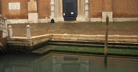 Boats float on back canals in Venice Italy. Shot filmed in 4k 2160p Stock Footage 120417696