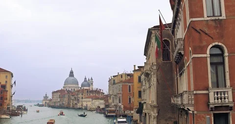 Boats float on back canals in Venice Italy. Shot filmed in 4k 2160p Stock Footage 120418540