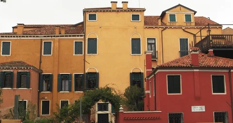 Boats float on back canals in Venice Italy. Shot filmed in 4k 2160p Stock Footage 120418982