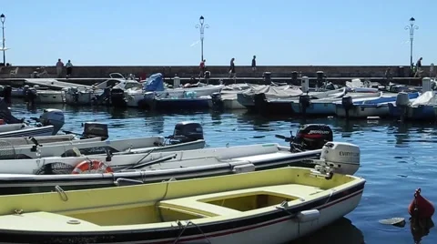 Boats float in the Garda harbour at Lake Garda	 動画素材 56031308