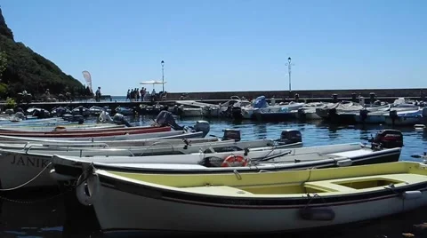 Boats float in the Garda harbour at Lake Garda 스톡 동영상 56031333