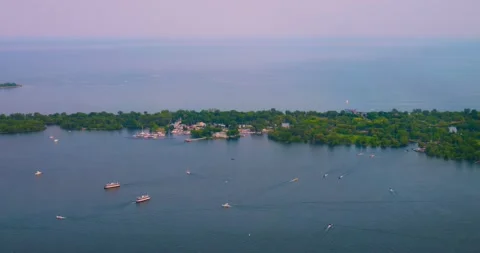 Boats float on surface lake Ontario, Canada. cinematic shot of boats float in Stock Footage 246741163