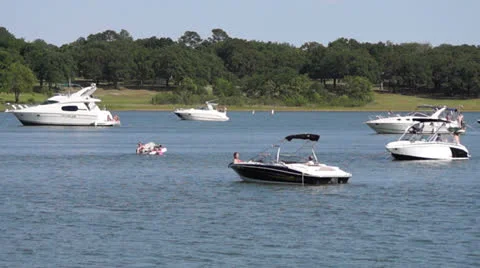 Boats floating in lake Stock Footage 25485413