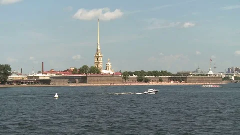Boats floating on the river Neva on a background of Peter and Paul Fortress Stock Footage 71807349