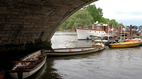 Boats floating on the River Thames under Richmond Bridge Stock Footage 109185594