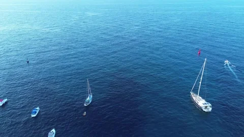 BOATS FLOATING IN THE IN THE SEA Stock Footage 314852689