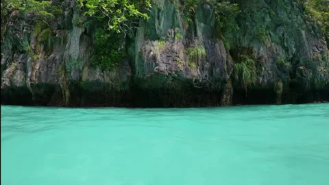 Boats glide through turquoise waters Stock Footage 310790171