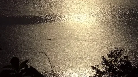 Boats on glittering lake surface. View from above Stock Footage 74450559