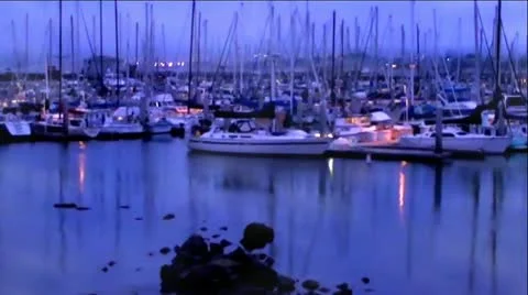 Boats in Harbor at Night With Drifting Clouds and Fog Stock Footage 11935910