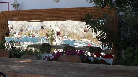 Boats in harbour reflected in rope framed  mirror Video stock 85299727