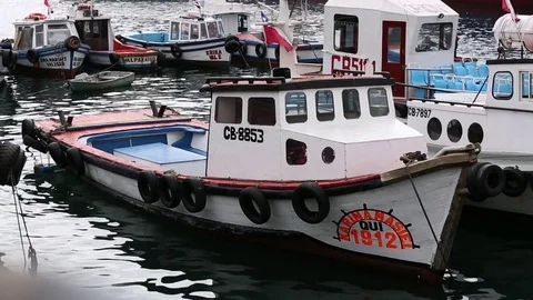 Boats in harbour with ship Stock Footage 77047783
