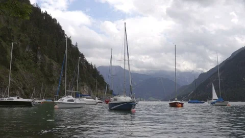 Boats on the lake between the mountains Stock Footage 81935841