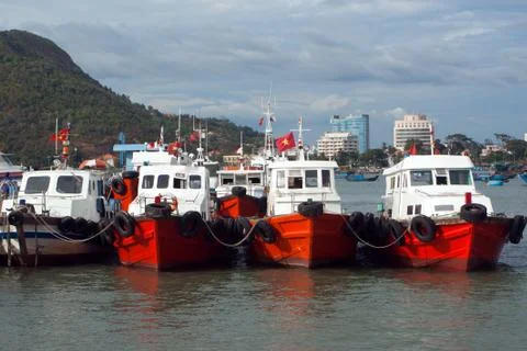 Boats lined up at a dock Stock Photos