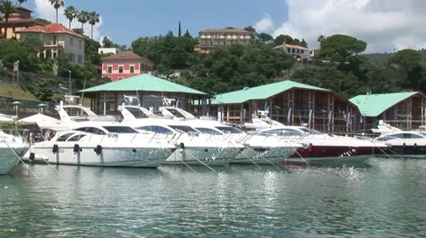 Boats lined up at port-side Stock Footage 22303620