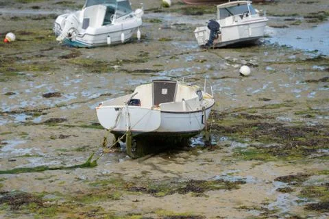 Boats at low tide Stock Photos