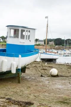 Boats at low tide Stock Photos