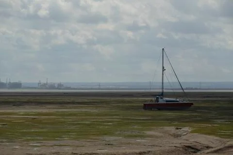 Boats in low tide Stock Photos